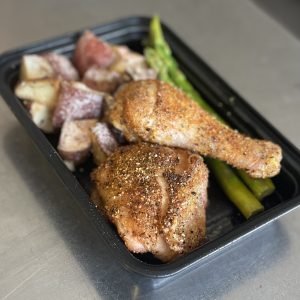 Basil, Citrus and Garlic Chicken Quarter with roast potato and asparagus