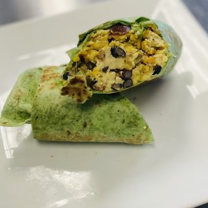 New Spinach Breakfast Burrito with chicken breakfast sausage, turkey bacon, black bean, egg, cherry peppers and cheese