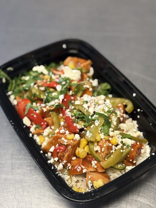 Ranchero Chicken with white rice, black beans, peppers, cotija and cilantro