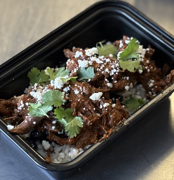 Birria Protein Bowl with white rice, black beans, pico de gallo, cilantro and topped with cotija cheese