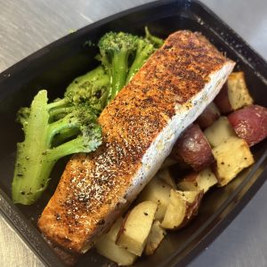 Grilled Salmon (6oz) with roasted red potatoes and grilled broccoli