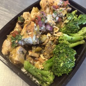Green Chili Chicken (6oz) with herbed rice, grilled broccoli and topped with pico de gallo