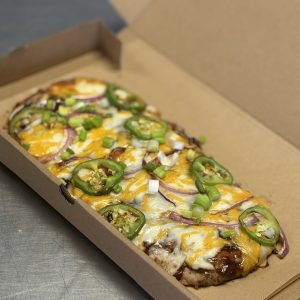 BBQ Chicken Pizza (ground chicken crust, cheddar cheese, jalapeno, red onion and sugar free BBQ sauce