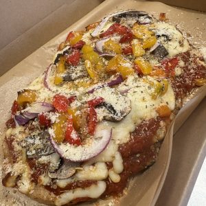 Ground Chicken Crust Supreme Pizza with marinara, bell peppers, mushroom, red onion, mozzarella and fresh parm