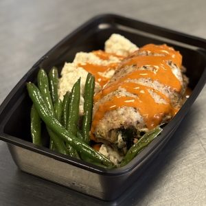 Cream Cheese and Broccoli Stuffed Chicken Cordon Bleu with Cauliflower Puree, Green Beans and Buffalo Drizzle