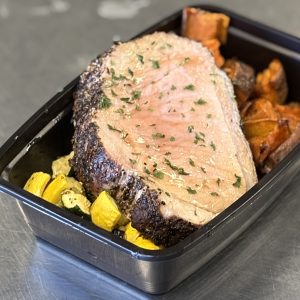 8oz Pork Loin with hibachi vegetables, roast sweet potatoes and topped with au jus