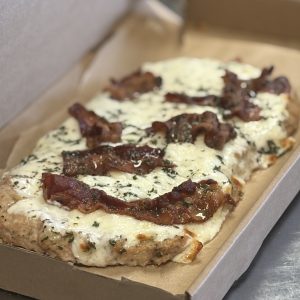 Chicken Bacon Ranch Protein Pizza on ground chicken crust