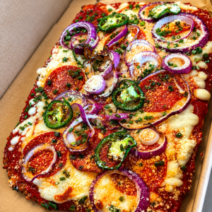 Pepperoni, Jalapeno and Red Onion Protein Pizza on our ground chicken crust