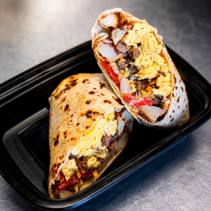 Bison Breakfast Burrito with scrambled egg, roast peppers, red potato, cheddar cheese and green salsa