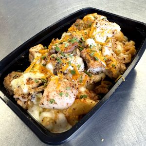 Cottage Cheese base Mac and Cheese with grilled chicken, cheddar and mozzarella